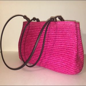 Vibrant & fun fuschia straw bag w/ leather straps & wooden bead accents. New!